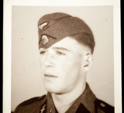 SS Photo: SS Totenkopf soldier with skull and runes emblems visible