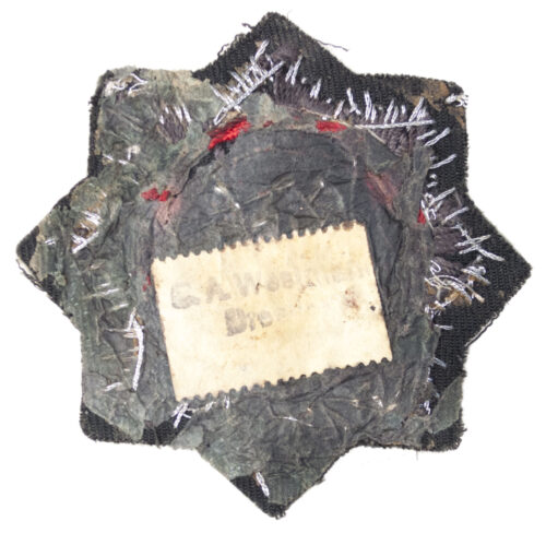 Deutsches Kreuz in Gold (DKIG) cloth with paper makers tag