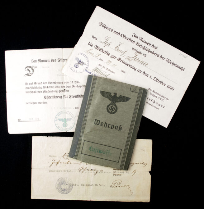 Luftwaffe Wehrpass with two medal citations (Sudetenland annexation medal + Frontkämpfer)