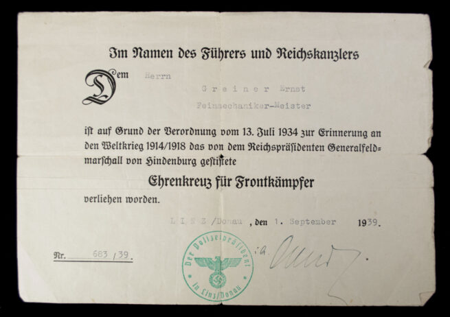 Luftwaffe Wehrpass with two medal citations (Sudetenland annexation medal + Frontkämpfer)