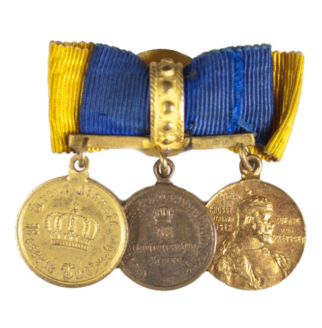 Miniature medals on buttonhole device (1871 Kriegsdenkmünze, Zentenaren medaille + Dienstauszeichnung)