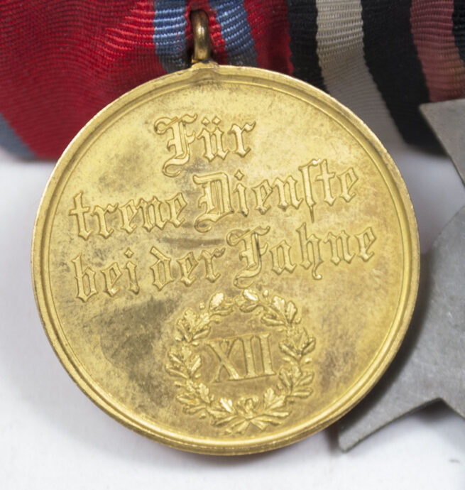 WWI Württemberg triple medalbar with Treue Dienste bei der Fahne XII Jahr, Kriegshilfskreuz, Nichtkämpferkreuz