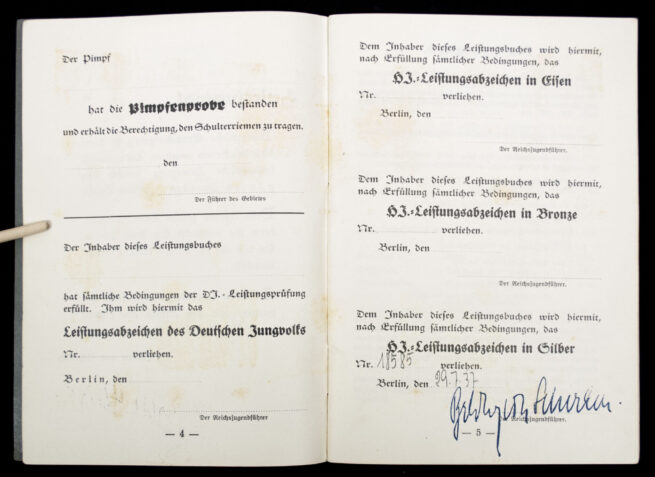 Hitlerjugend (HJ) Leistungsbuch + documents + cloth Leistungsabzeichen grouping