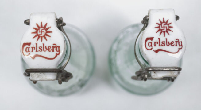 (Denmark) Two Carlsberg Beer bottles World War II with swastika bottle caps (1934 + 1936)