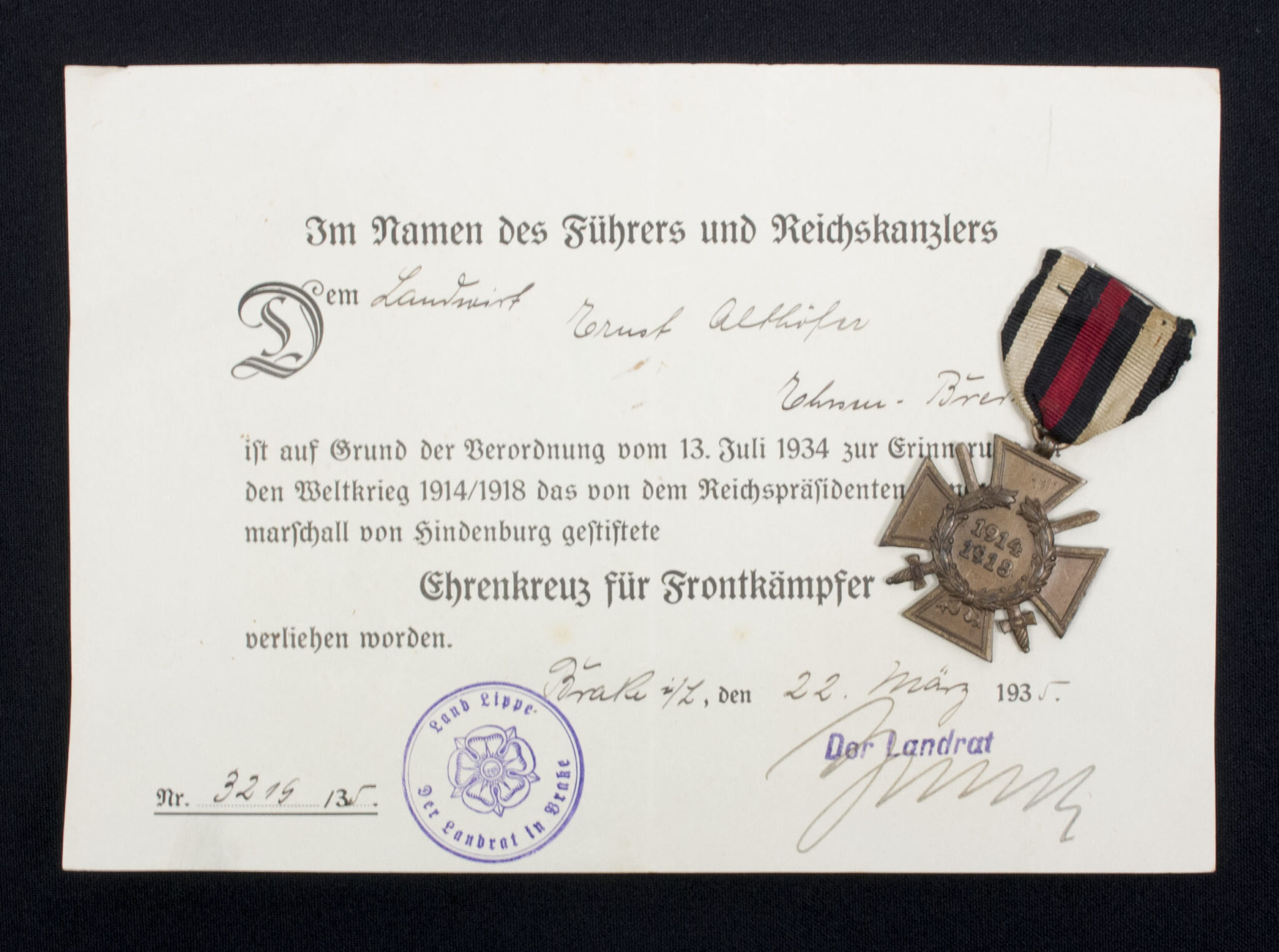 Ehrenkreuz für Frontkämpfer + citation (Land Lippe / Brake)