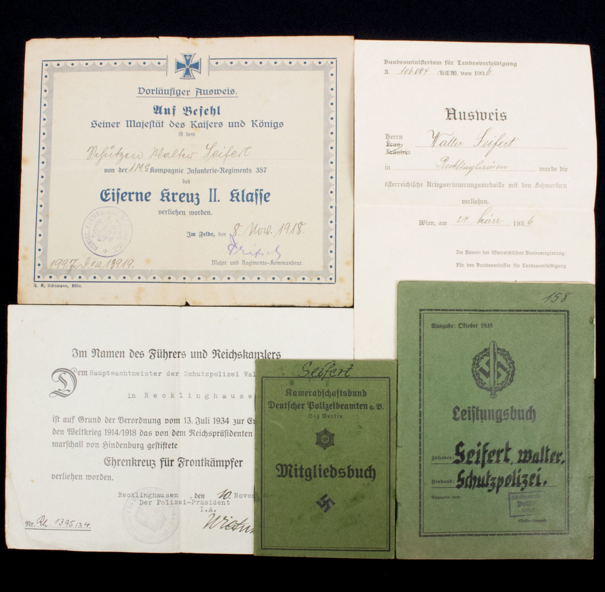 SA group with SA Leistungsbuch + Kameradschaftsbund Deutscher Polizeibeamten Mitgliedsbuch + Citations EK2, FEK, and more