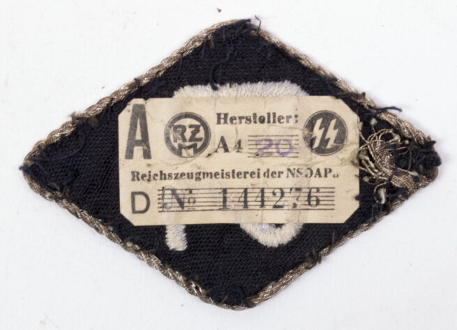 SS arm-insignia for an officer of the SD-Reichs Sicherheitsdienst (with paper RZM tag)