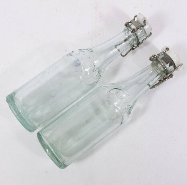 Two Carlsberg Beerlemonade bottles World War II with swastika