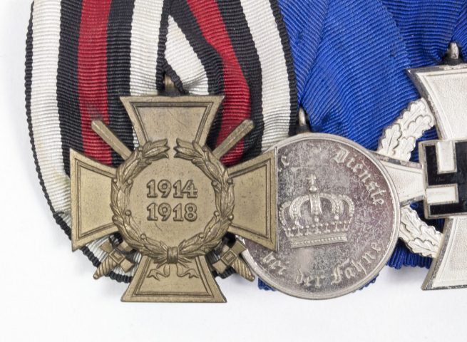 German WWII medalbar with Frontkàmpofer Ehrenkreuz + Im Dienste bei der Fahne + Treue Dienst 25 Jahre