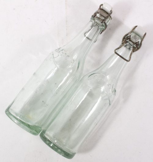 (Denmark) Two Carlsberg Beerlemonade bottles World War II with swastika bottle caps