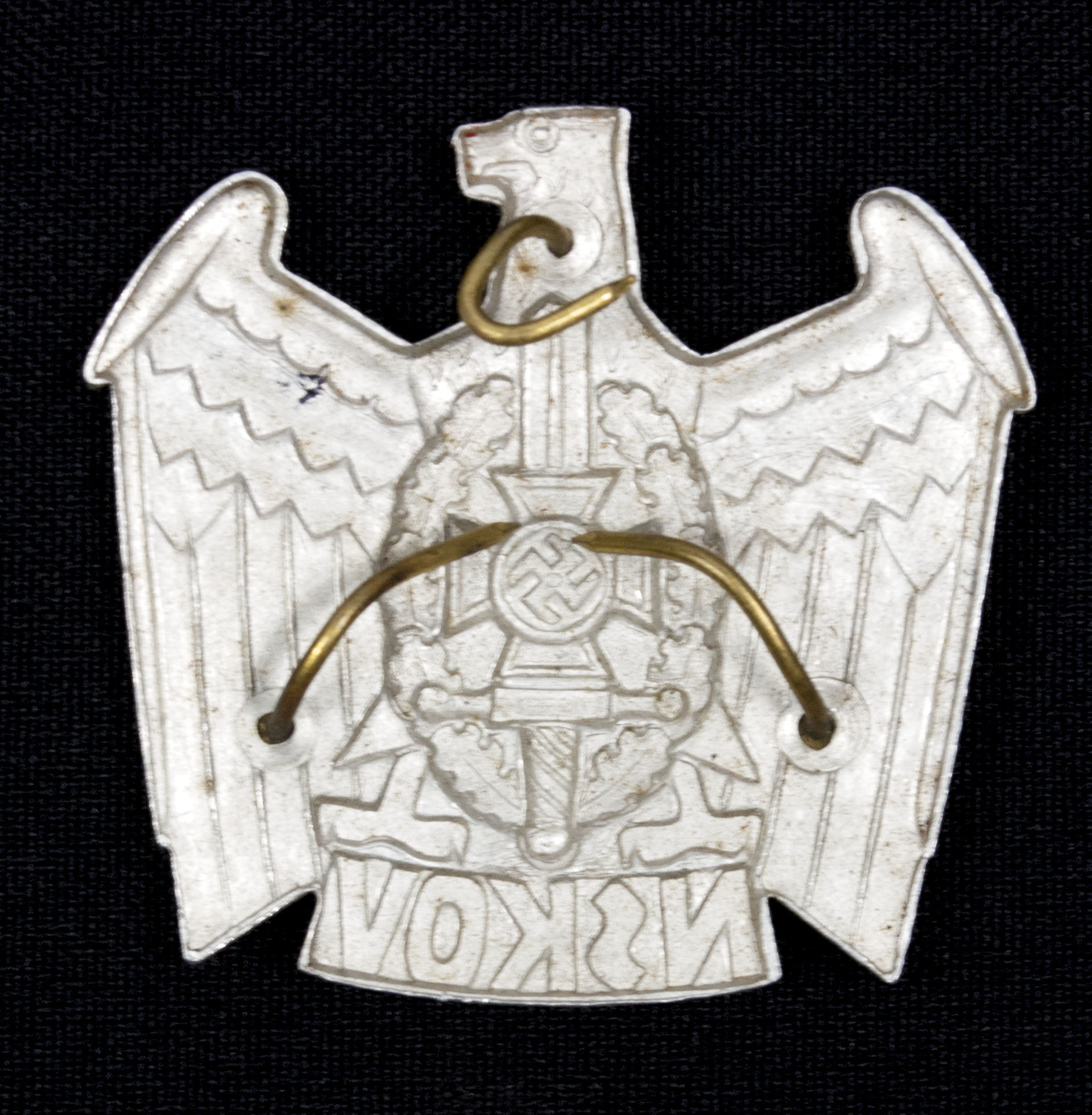 NSKOV cap badge