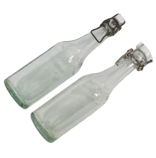 (Denmark) Two Carlsberg Beerlemonade bottles World War II with swastika bottle caps