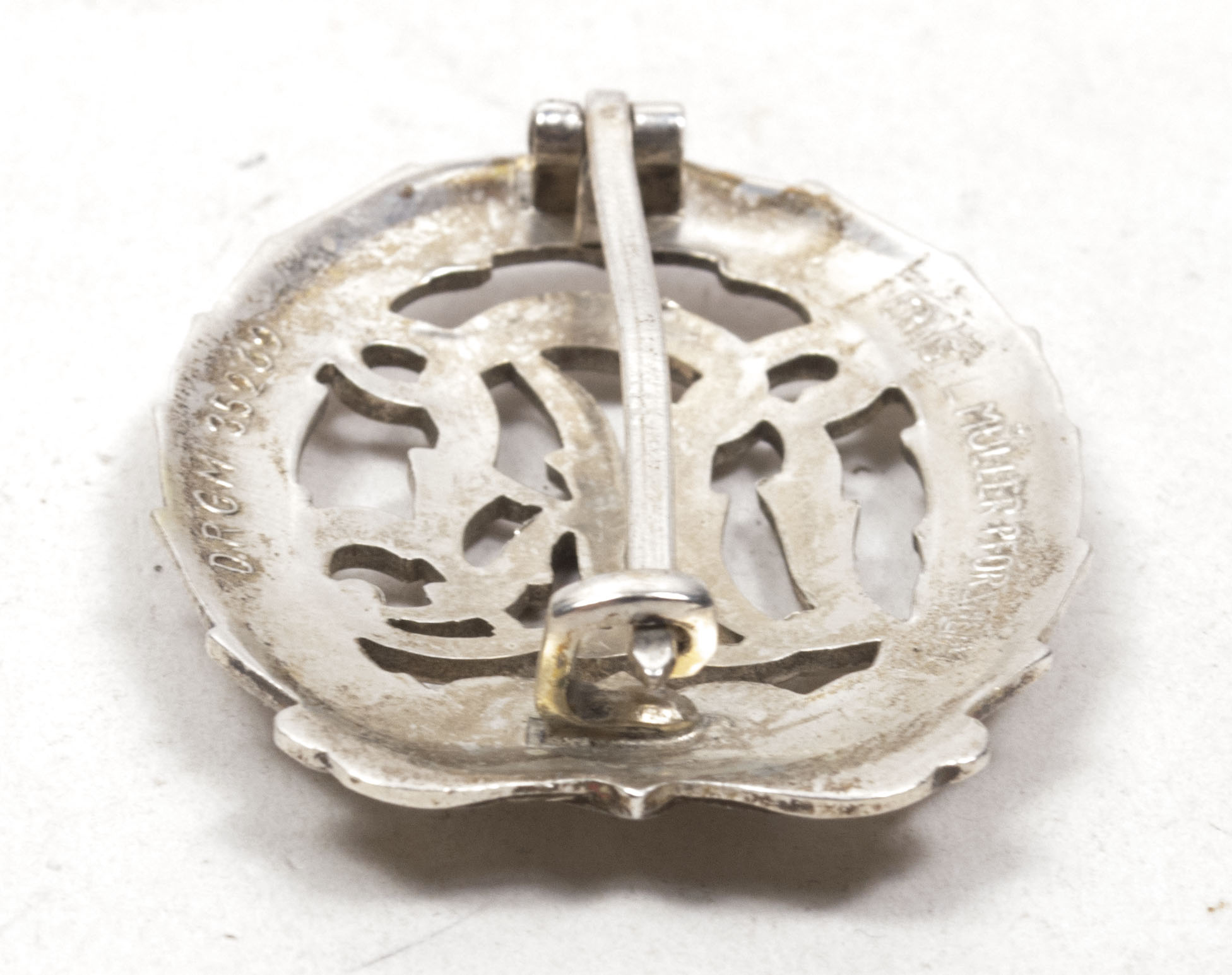 Deutsches Reichssportabzeichen (DRL) silber – (Maker Ernst L. Müller)