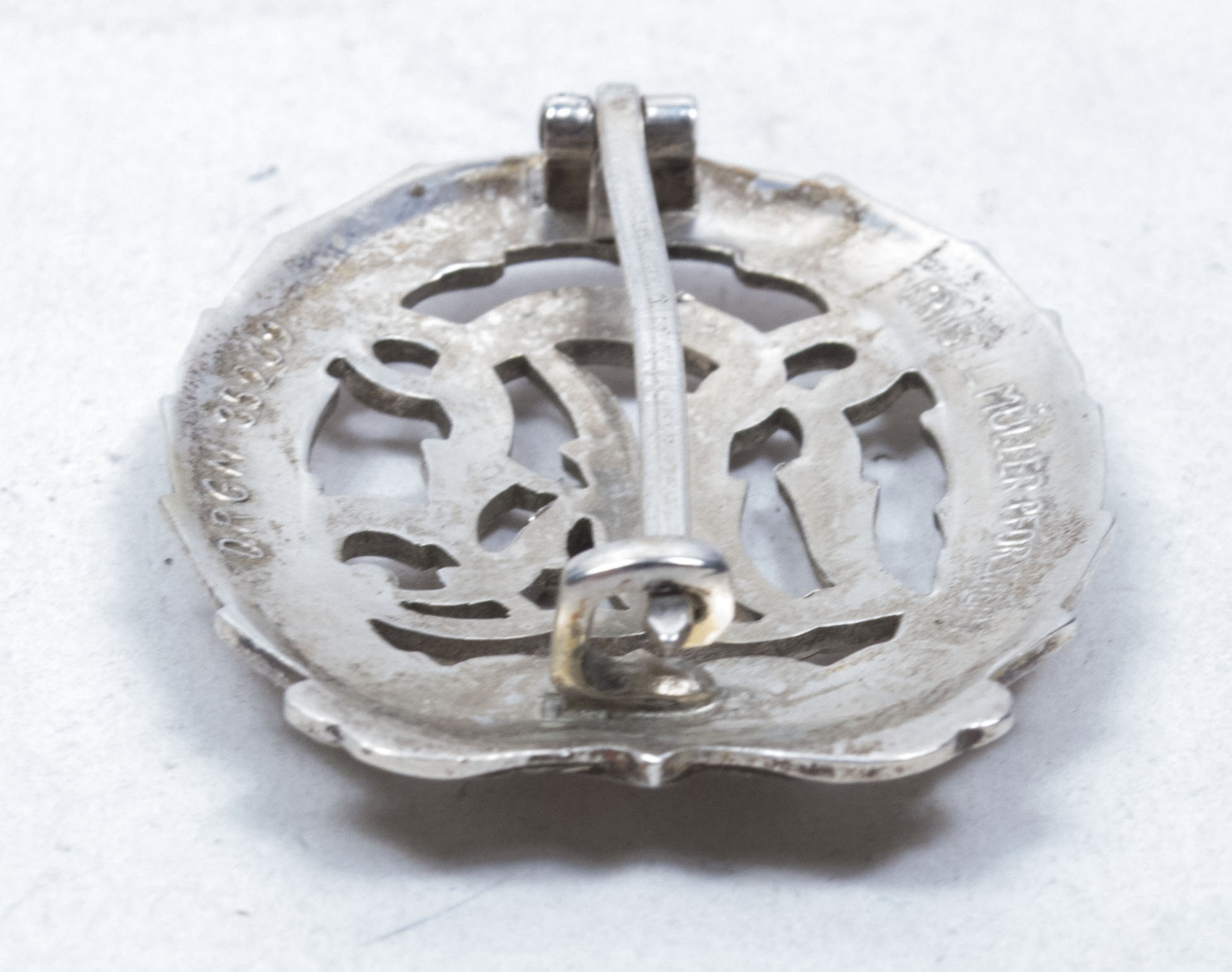 Deutsches Reichssportabzeichen (DRL) silber – (Maker Ernst L. Müller)