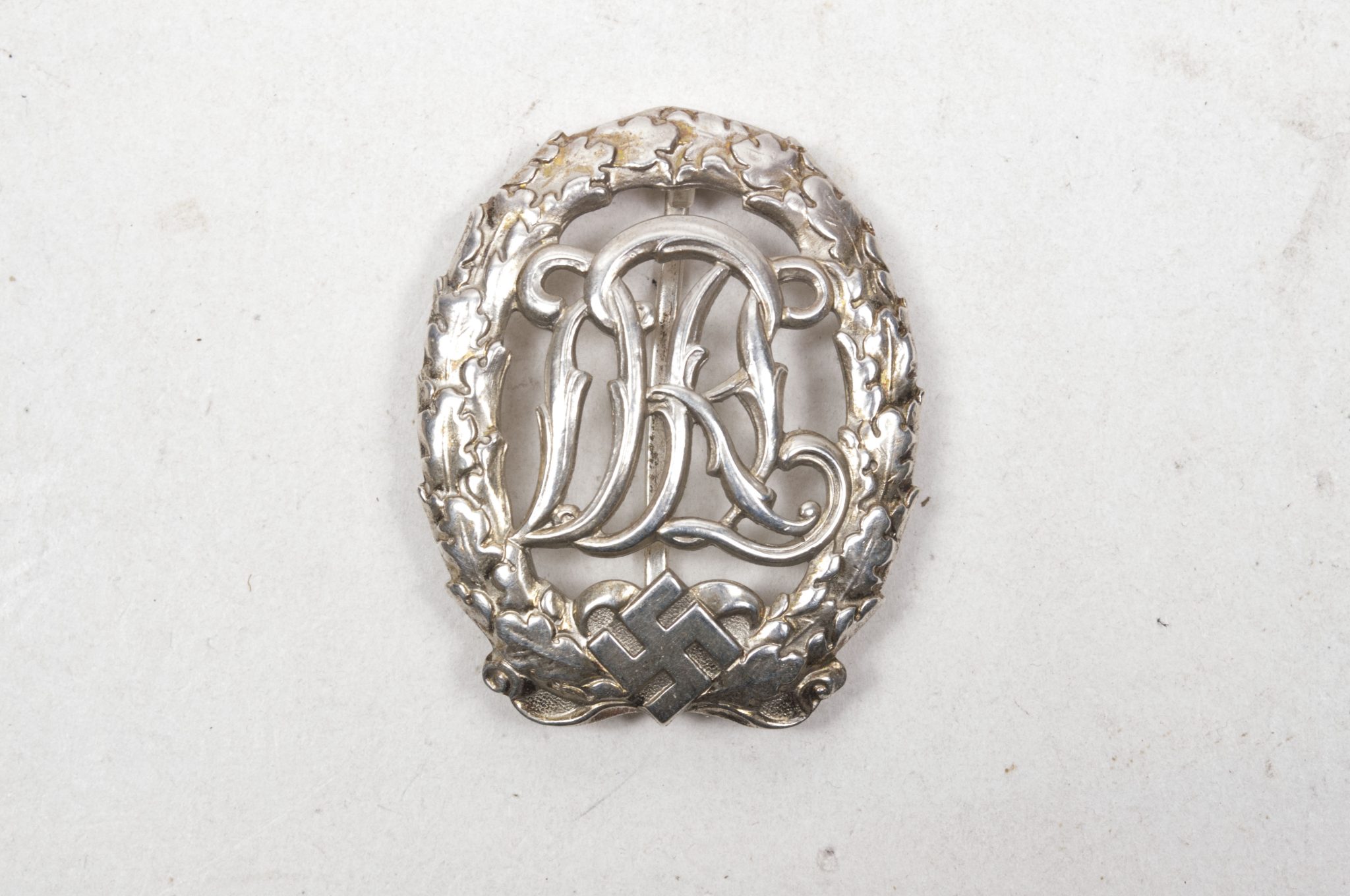 Deutsches Reichssportabzeichen (DRL) silber – (Maker Ernst L. Müller)