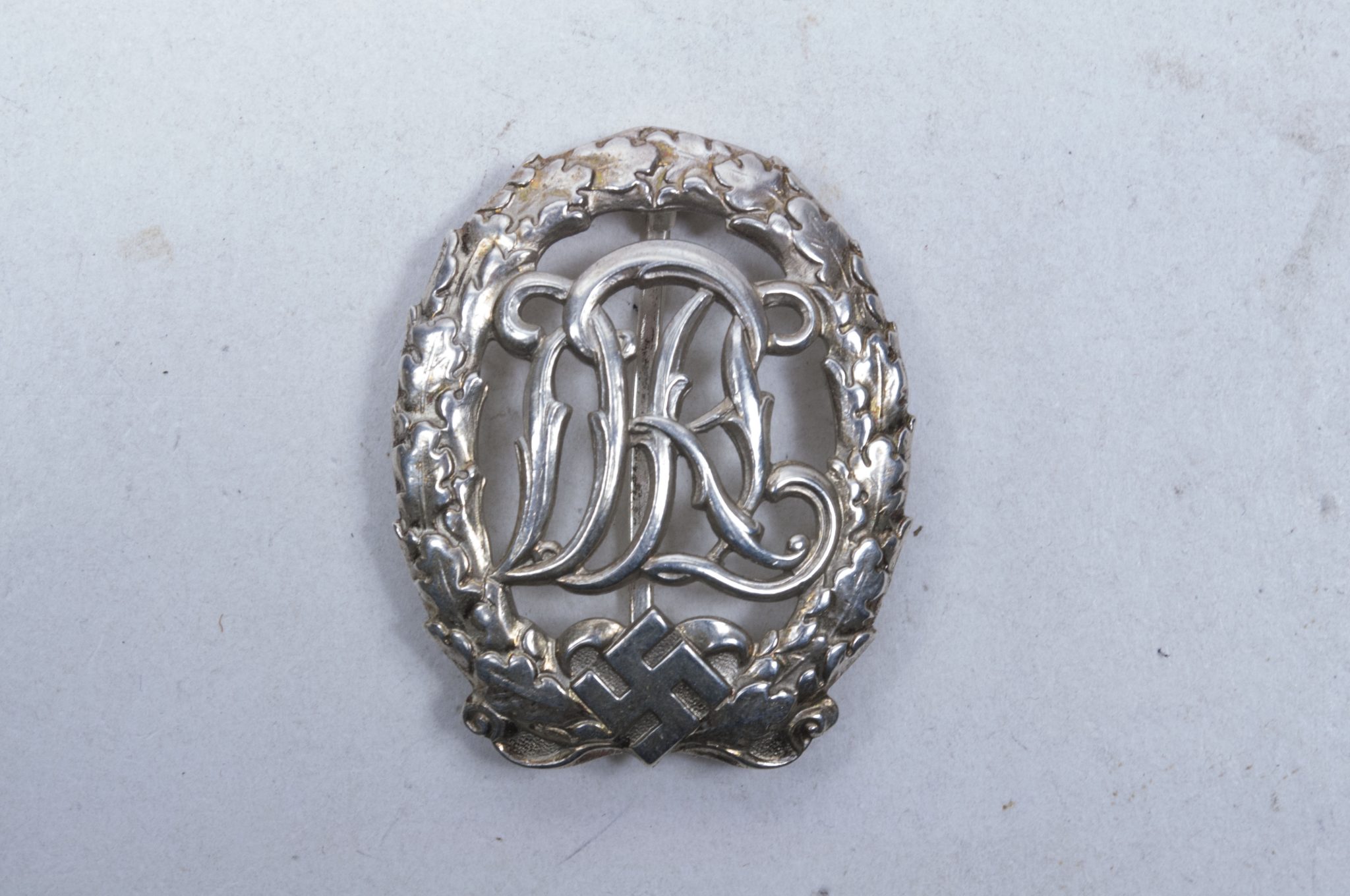 Deutsches Reichssportabzeichen (DRL) silber – (Maker Ernst L. Müller)