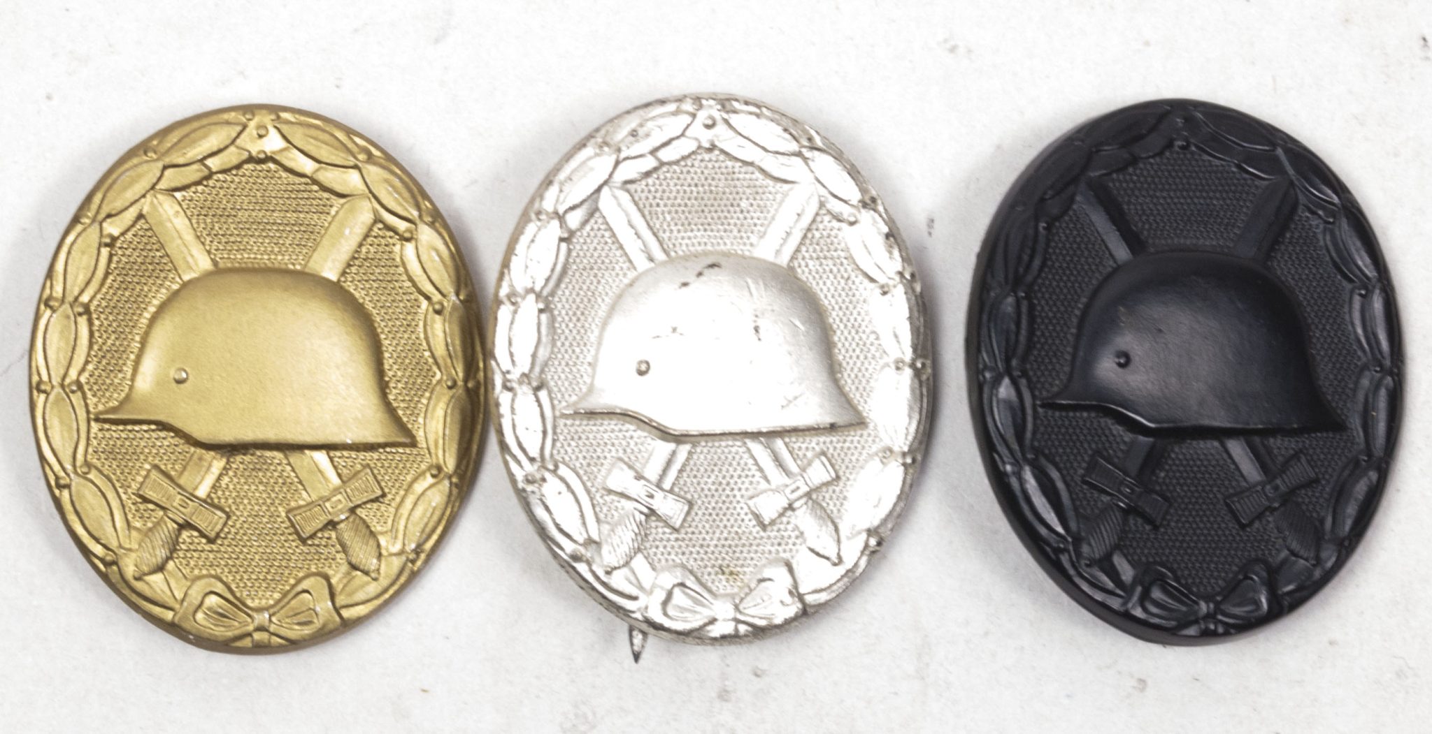 Verwundetenabzeichen 57-awards Gold, Zilver, Bronze (2)