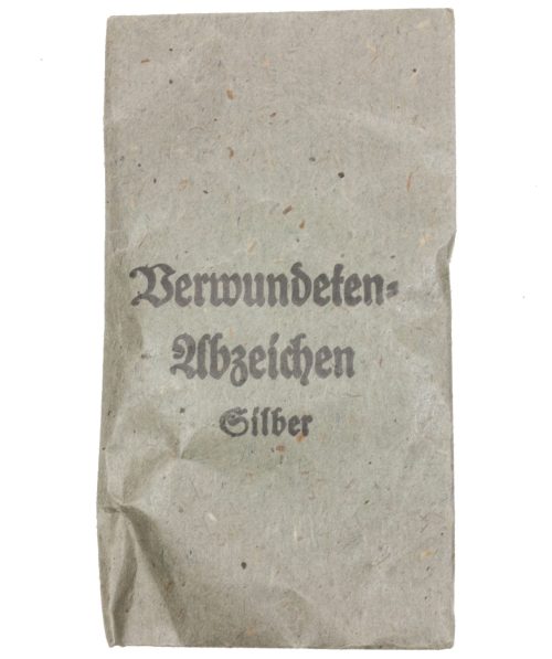 Verwundetenabzeichen Silber + Tüte (MM Steinhauer & Lück Lüdenscheid) - Unissued