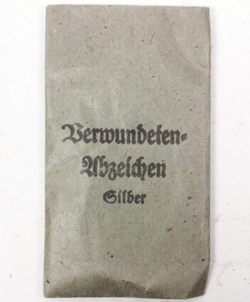 Verwundetenabzeichen Silber + Tüte (MM Steinhauer & Lück Lüdenscheid) - Unissued