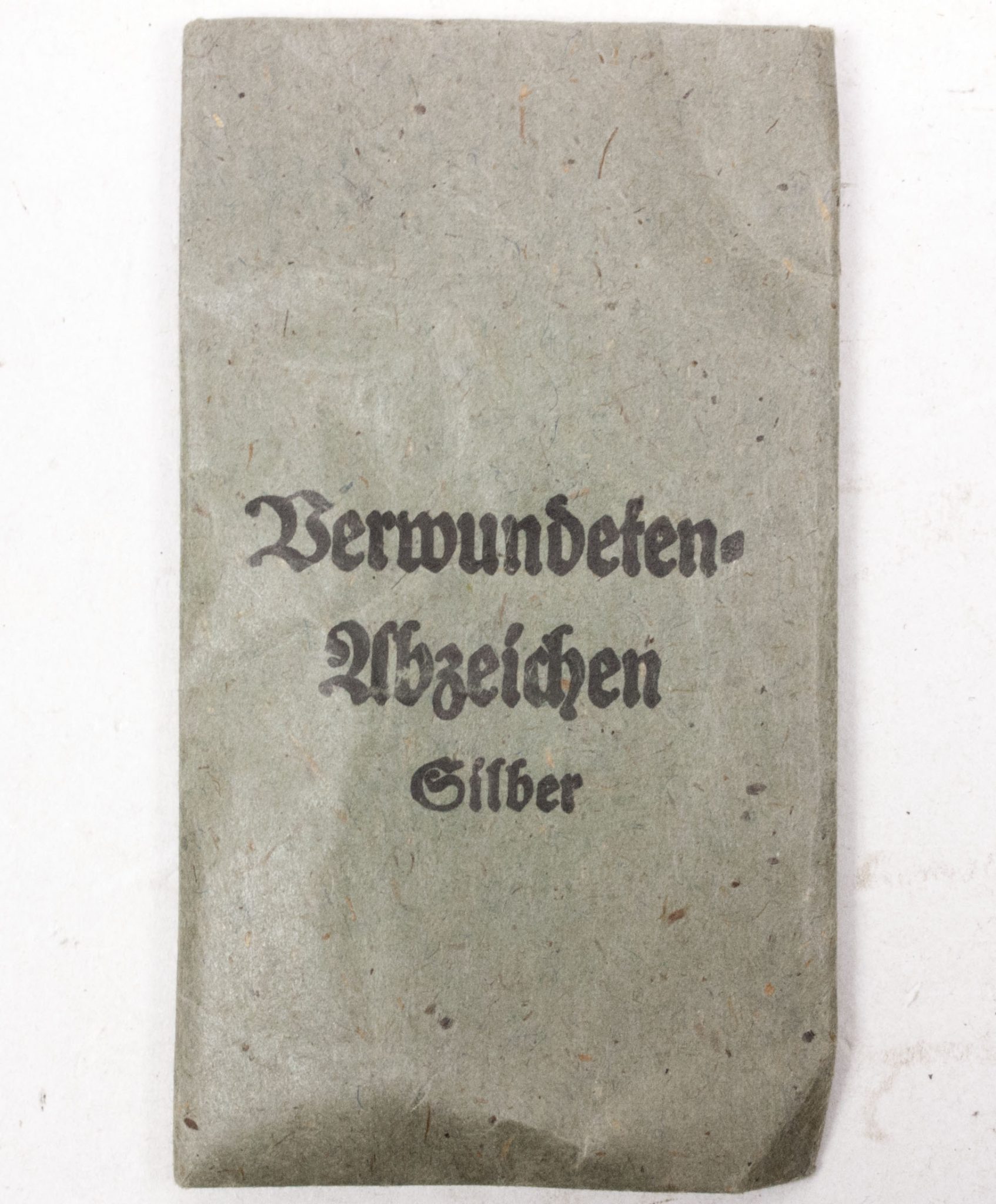 Verwundetenabzeichen Silber + Tüte (MM Steinhauer & Lück Lüdenscheid) - Unissued