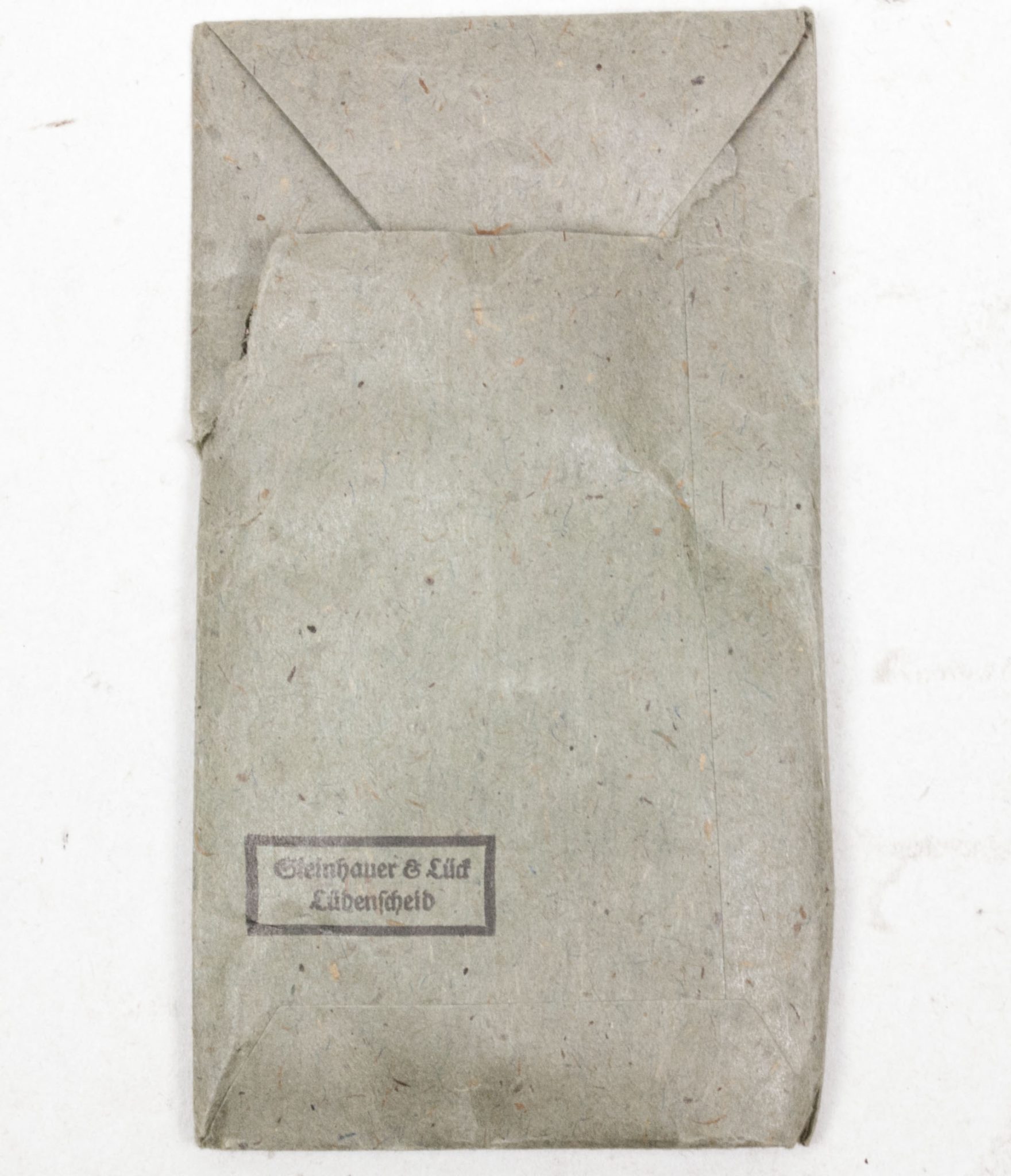 Verwundetenabzeichen Silber + Tüte (MM Steinhauer & Lück Lüdenscheid) - Unissued