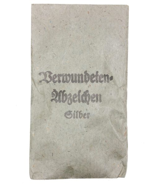 Verwundetenabzeichen Silber + Tüte (MM Steinhauer & Lück Lüdenscheid) - Unissued