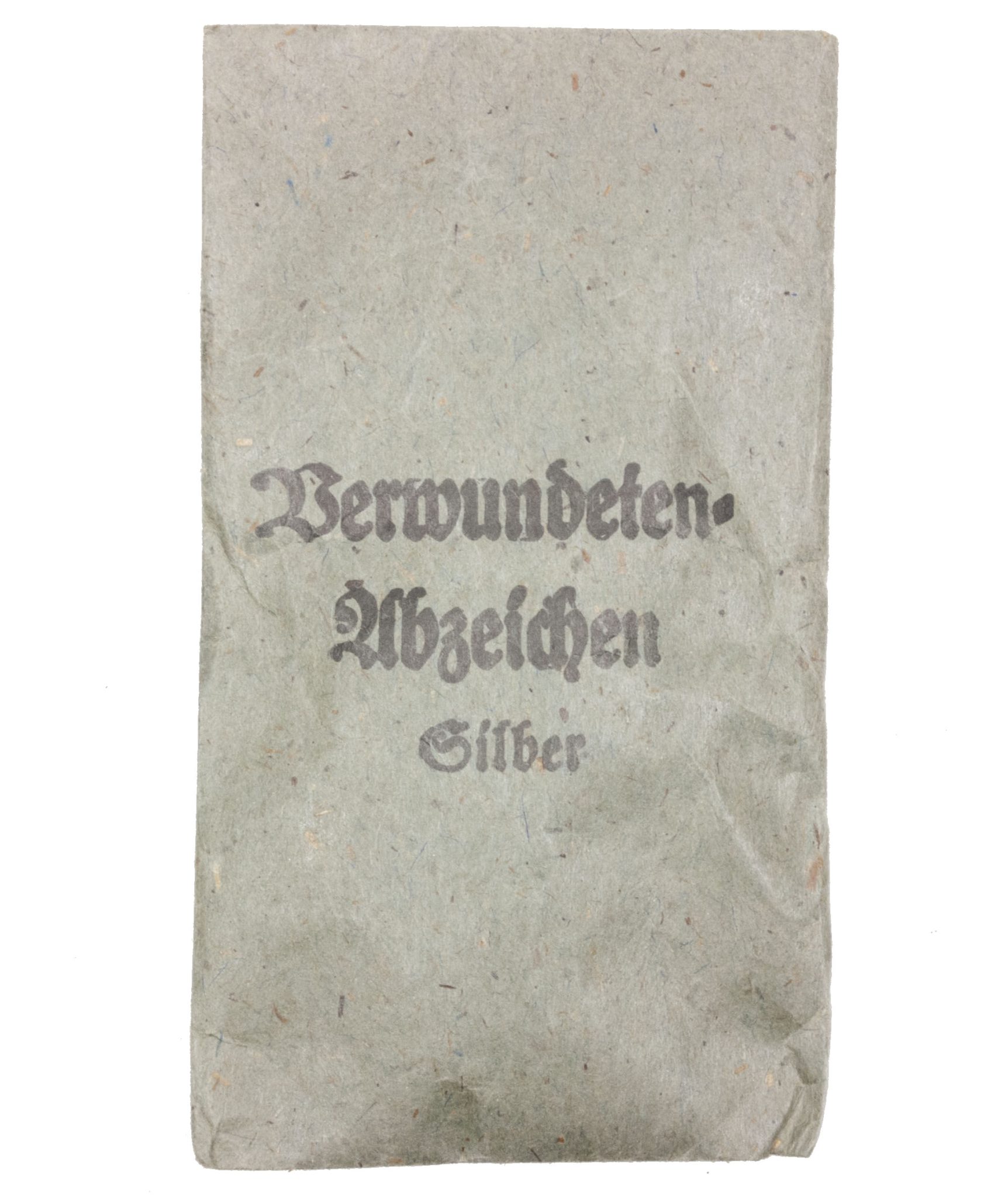 Verwundetenabzeichen Silber + Tüte (MM Steinhauer & Lück Lüdenscheid) - Unissued