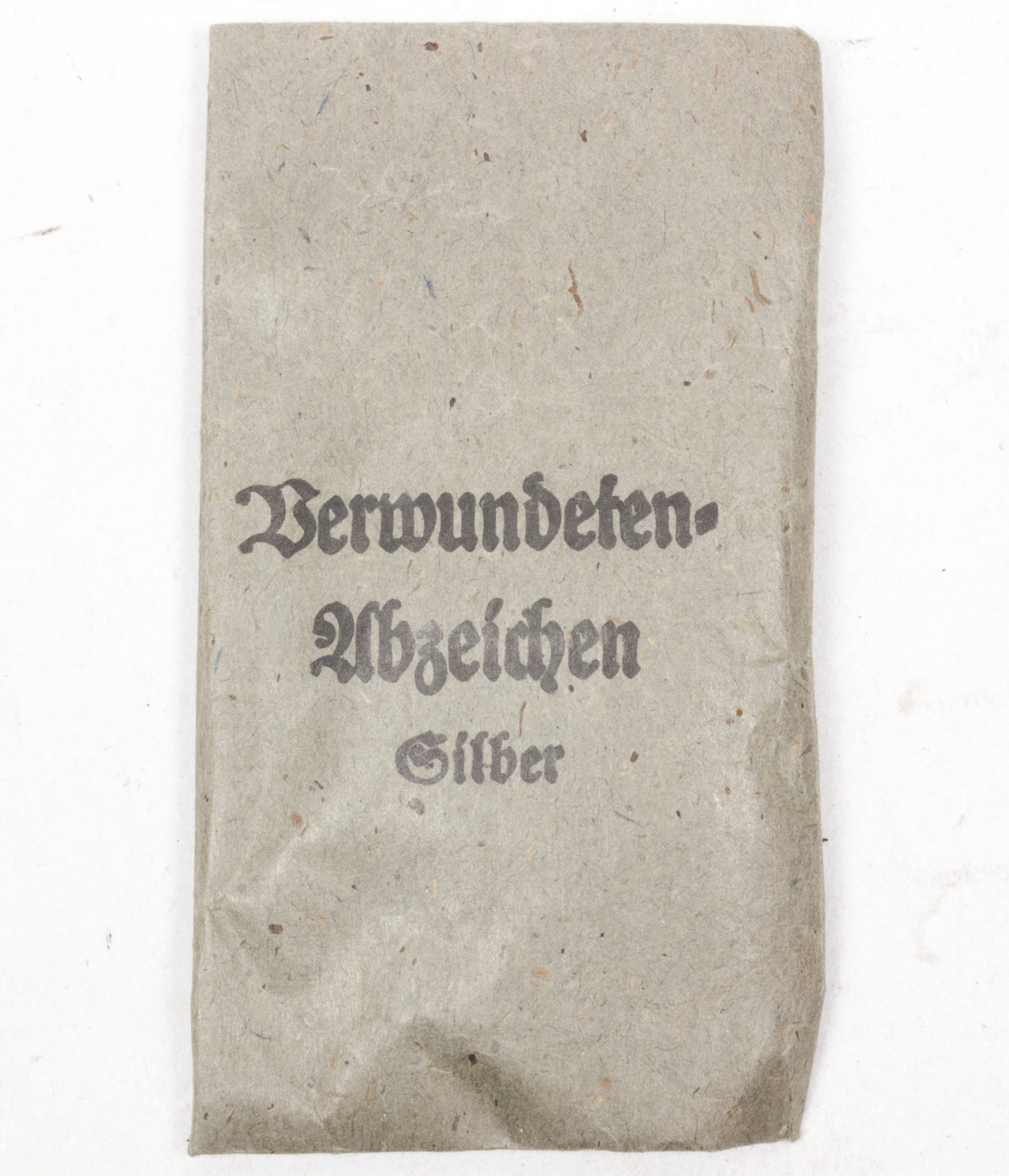 Verwundetenabzeichen Silber + Tüte (MM Steinhauer & Lück Lüdenscheid) - Unissued