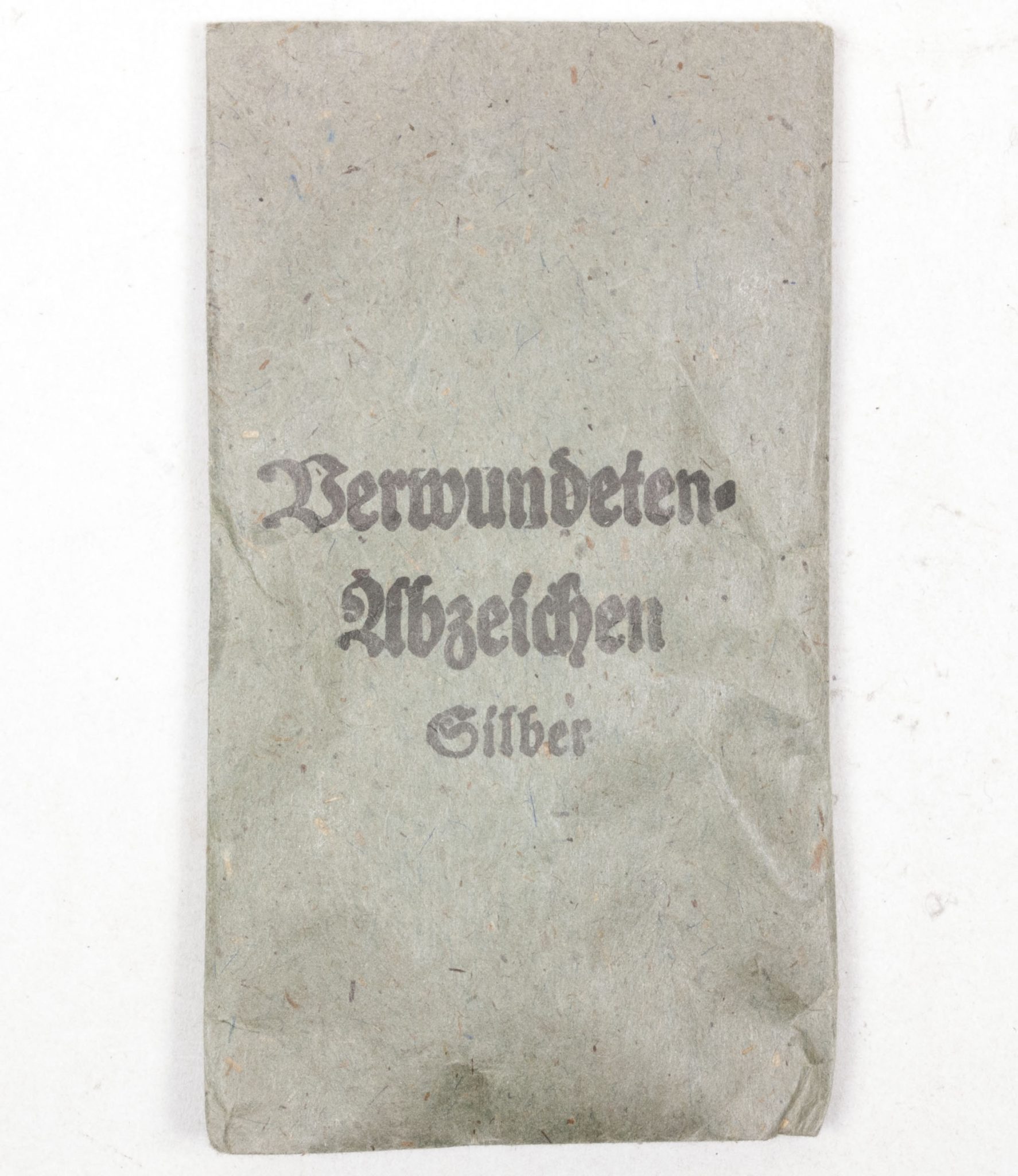 Verwundetenabzeichen Silber + Tüte (MM Steinhauer & Lück Lüdenscheid) - Unissued