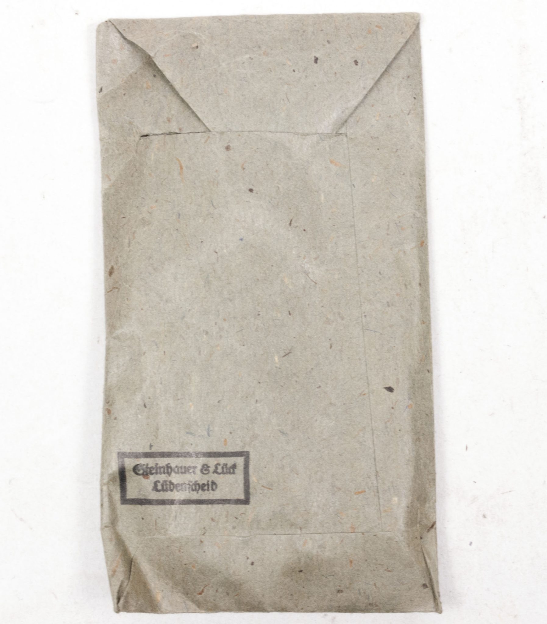 Verwundetenabzeichen Silber + Tüte (MM Steinhauer & Lück Lüdenscheid) - Unissued