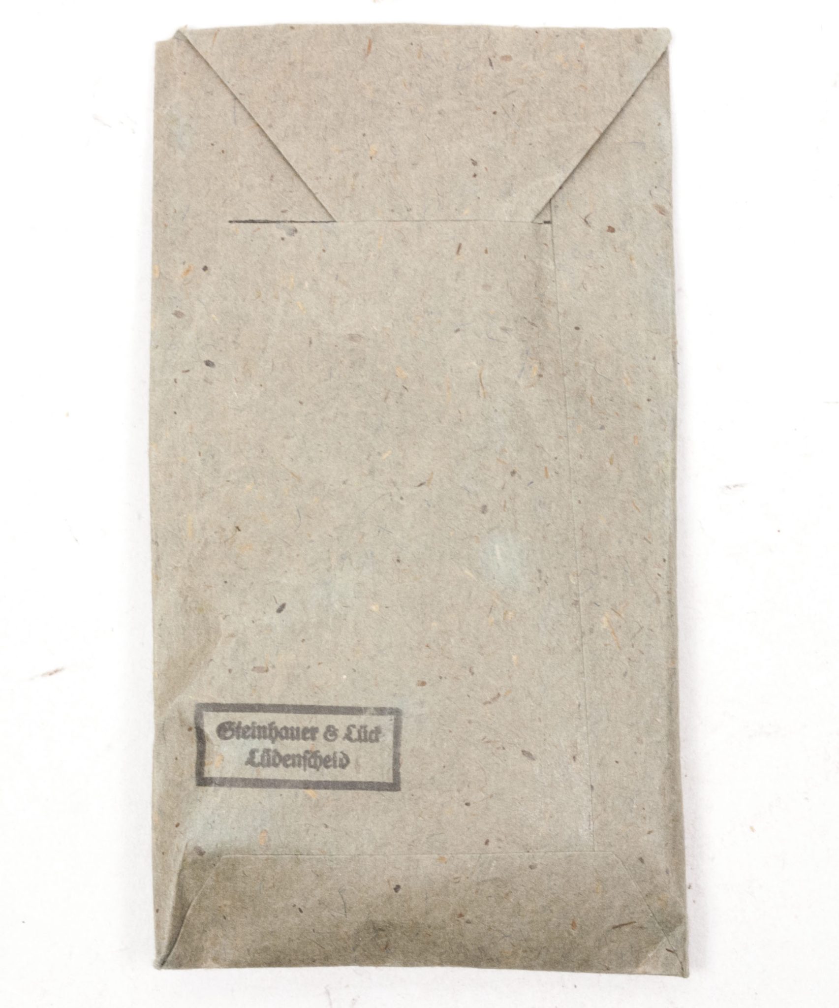 Verwundetenabzeichen Silber + Tüte (MM Steinhauer & Lück Lüdenscheid) - Unissued