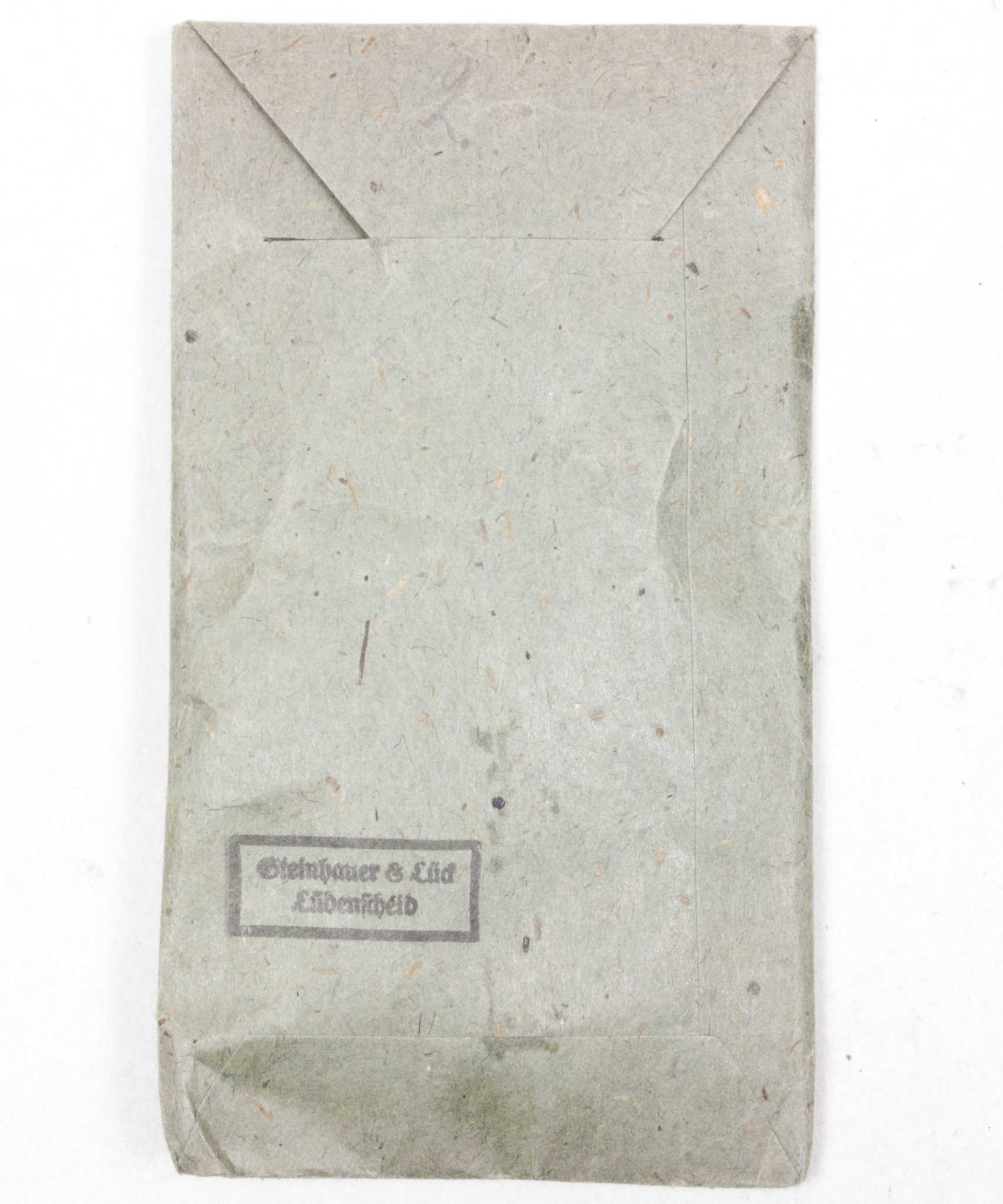 Verwundetenabzeichen Silber + Tüte (MM Steinhauer & Lück Lüdenscheid) - Unissued