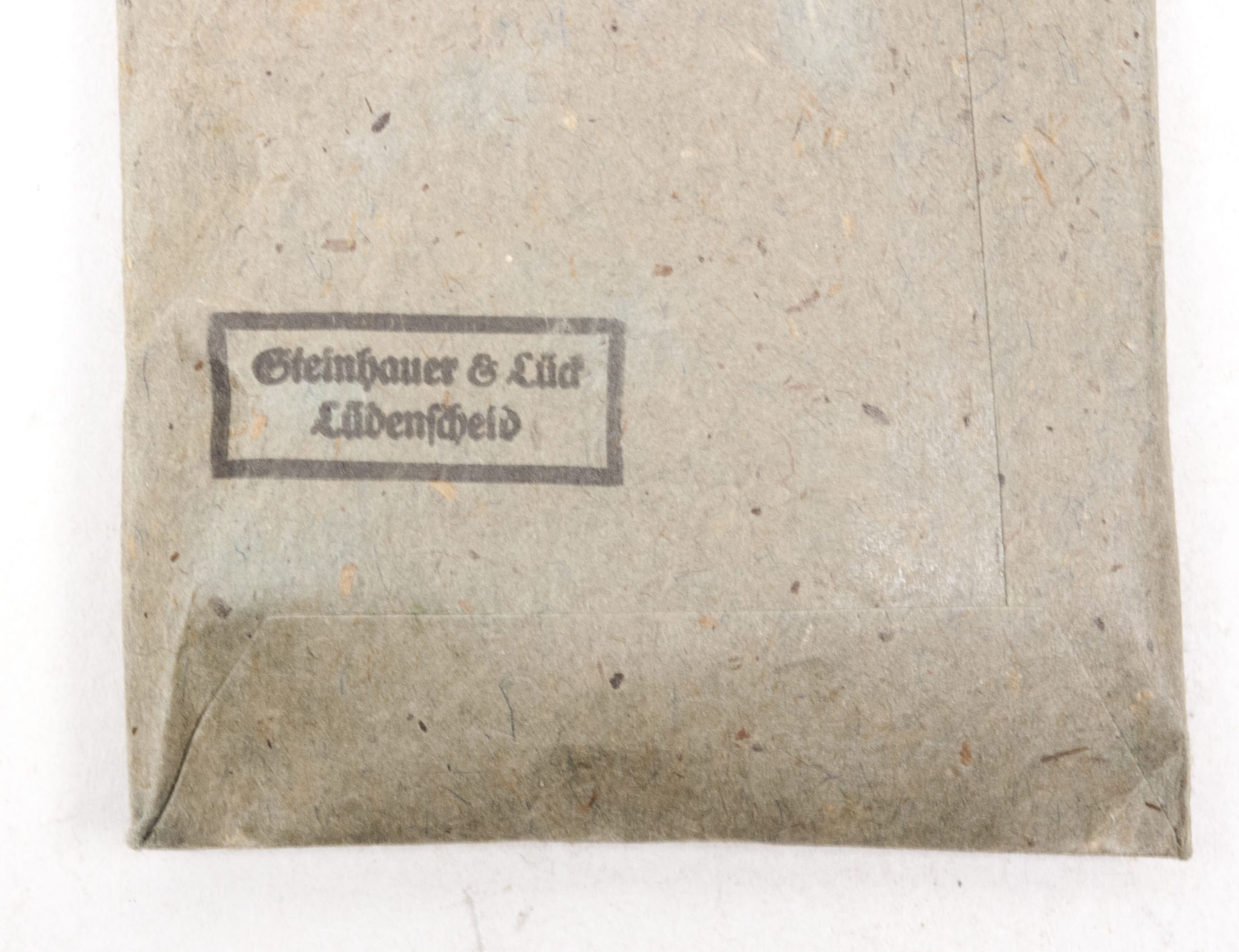 Verwundetenabzeichen Silber + Tüte (MM Steinhauer & Lück Lüdenscheid) - Unissued