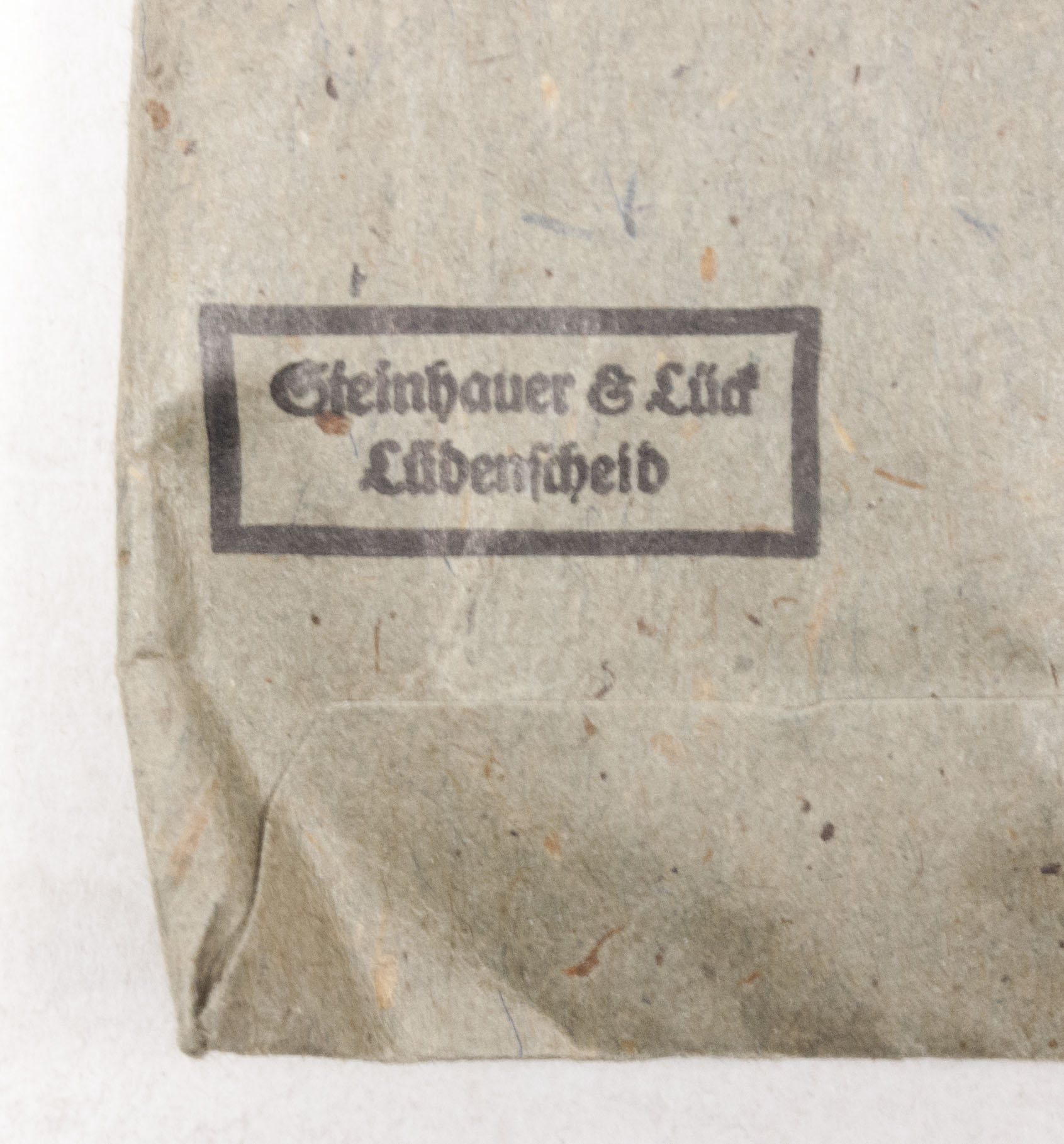 Verwundetenabzeichen Silber + Tüte (MM Steinhauer & Lück Lüdenscheid) - Unissued