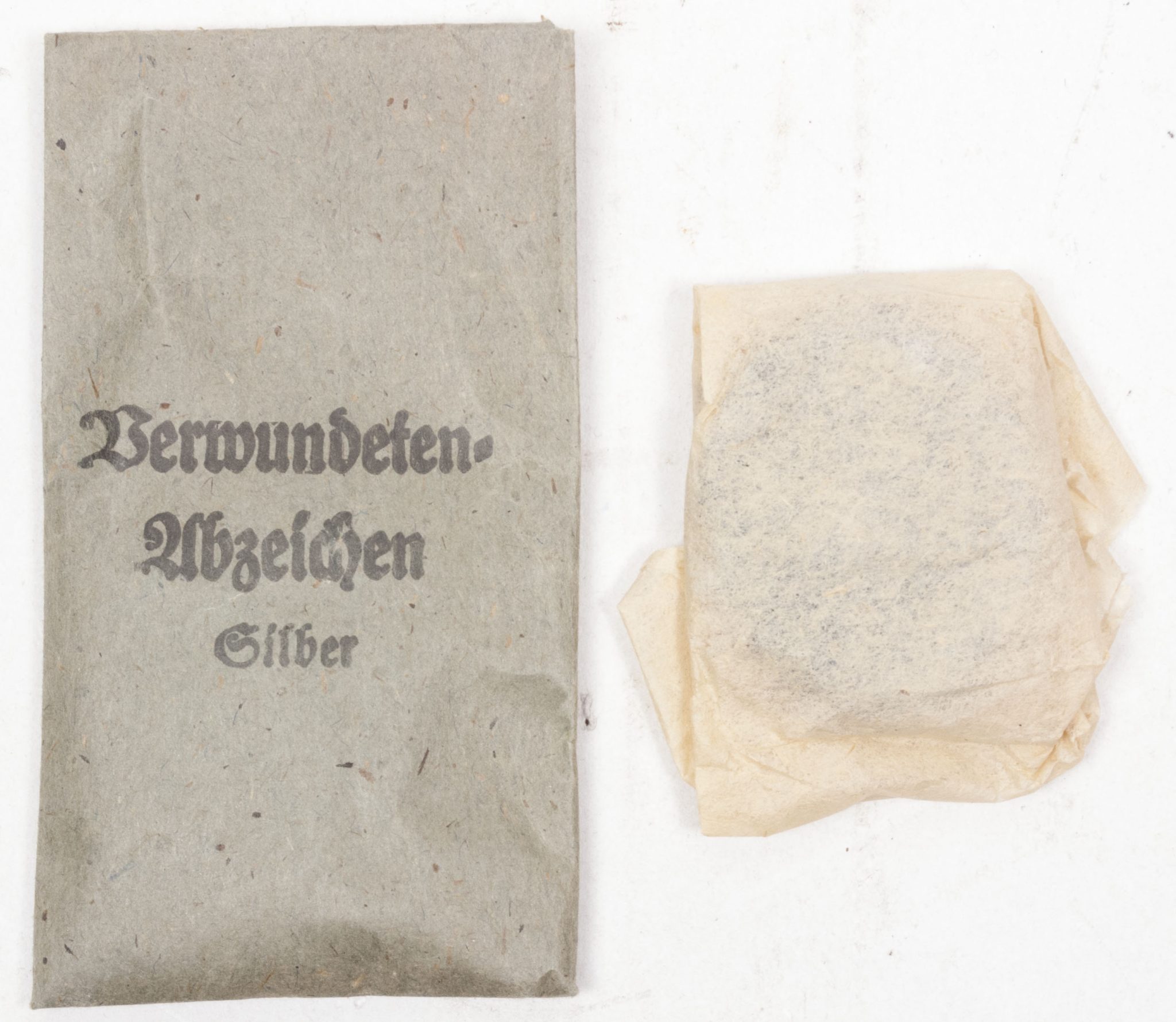 Verwundetenabzeichen Silber + Tüte (MM Steinhauer & Lück Lüdenscheid) – Unissued (6) Verwundetenabzeichen Silber + Tüte (MM Steinhauer & Lück Lüdenscheid) - Unissued