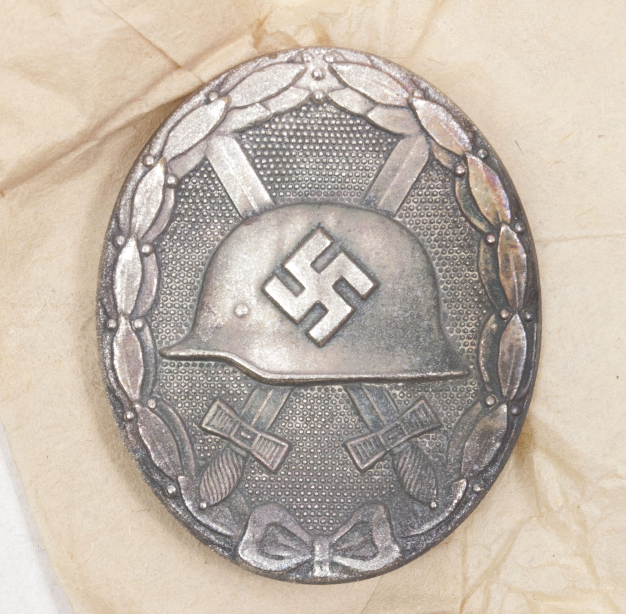 Verwundetenabzeichen Silber + Tüte (MM Steinhauer & Lück Lüdenscheid) – Unissued (9) Verwundetenabzeichen Silber + Tüte (MM Steinhauer & Lück Lüdenscheid) - Unissued