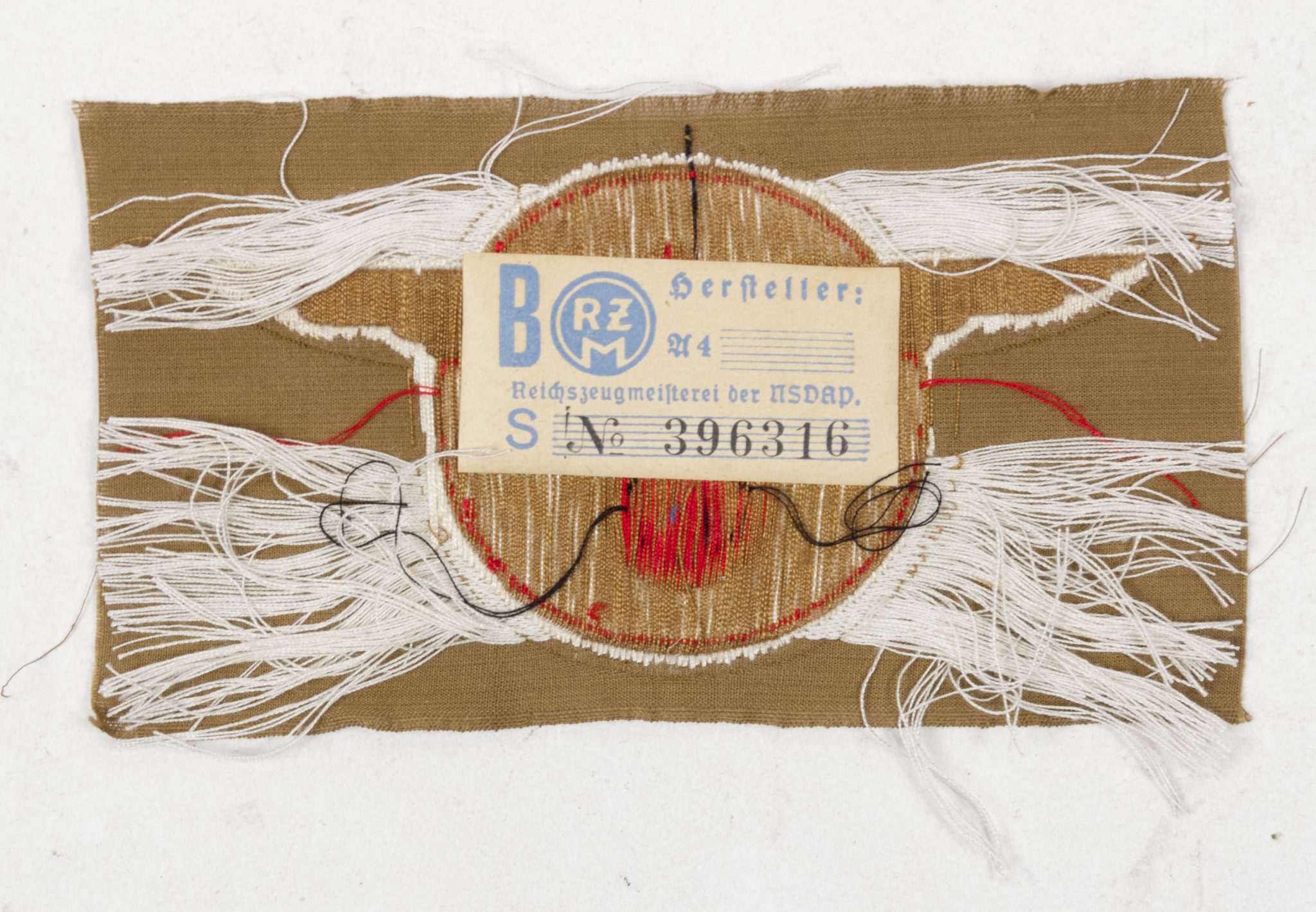 N.S.D.A.P. Reichsautozug breast insignia (With RZM paper label) (4) N.S.D.A.P. Reichsautozug breast insignia (With RZM paper label)