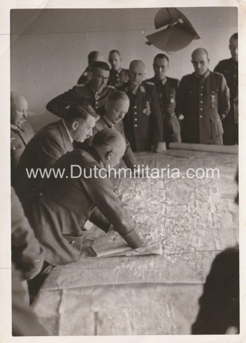 (Pressphoto)  Chancellor Adolf Hitler and officers of the General Staff working out the offensive against Stalingrad. Poltava 9th May 1942