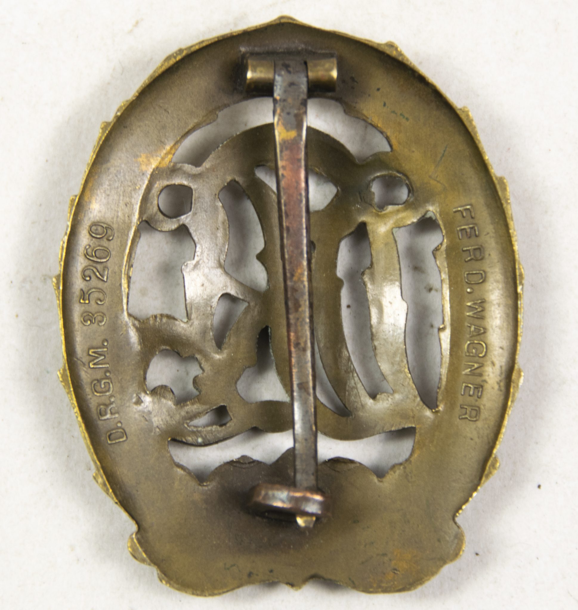 Deutsches Reichssportabzeichen (DRL) bronze – (Maker Ferd. Wagner). (2) Deutsches Reichssportabzeichen (DRL) bronze – (Maker Ferd. Wagner).