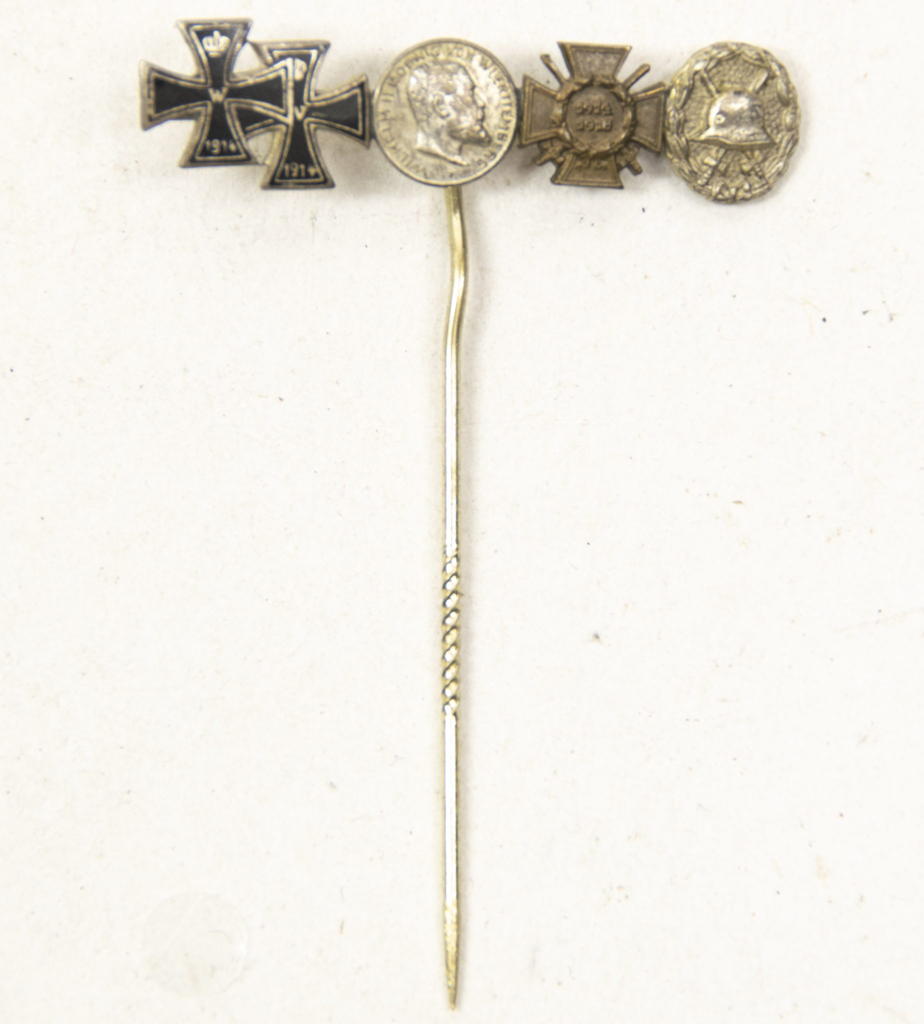 German WWI lapel stickpin with EK1 + EK2 + Hessen Bravery medal + Frontkämpfer Ehrenkreuz + Silver woundbadge (2) German WWI lapel stickpin with EK1 + EK2 + Hessen Bravery medal + Frontkämpfer Ehrenkreuz + Silver woundbadge