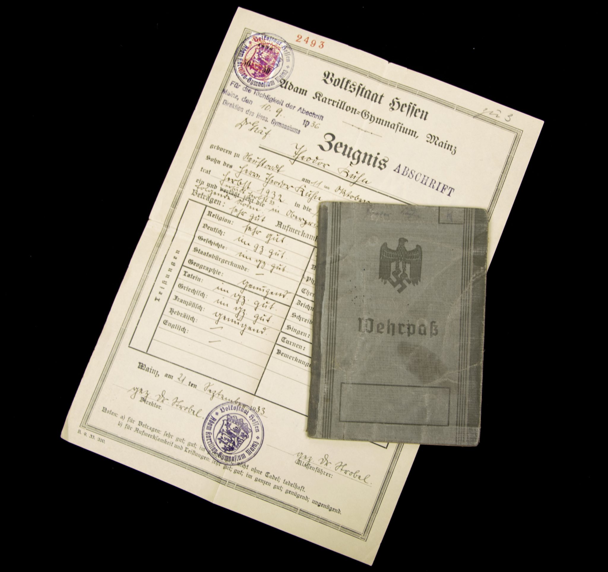 Wehrpass 4.E. (M.G.) Kp. 116 (1939) with EK2 + VWA Black