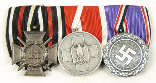 German WWII medalbar with Frontkämper Ehrenkreuz + Volkspflege medaille + Luftschutz medaille